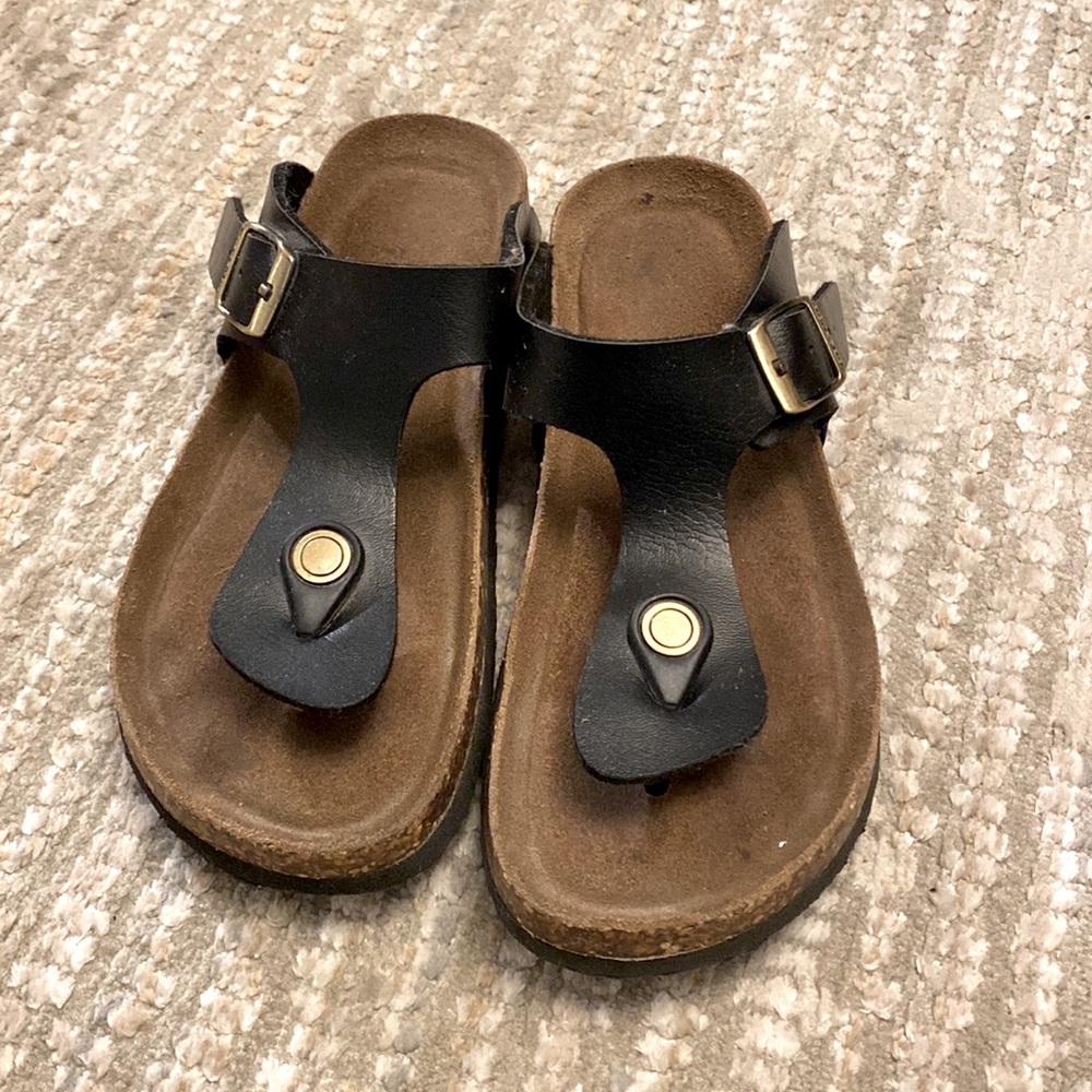 Softmocs sandals, like Birkenstock.  Size 1 adjustable straps.